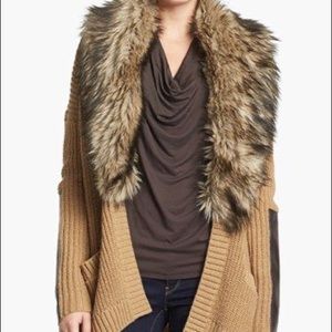 BN Michael Kors sweater with foux fur wrapped around. Comfy and a stretchy fit.